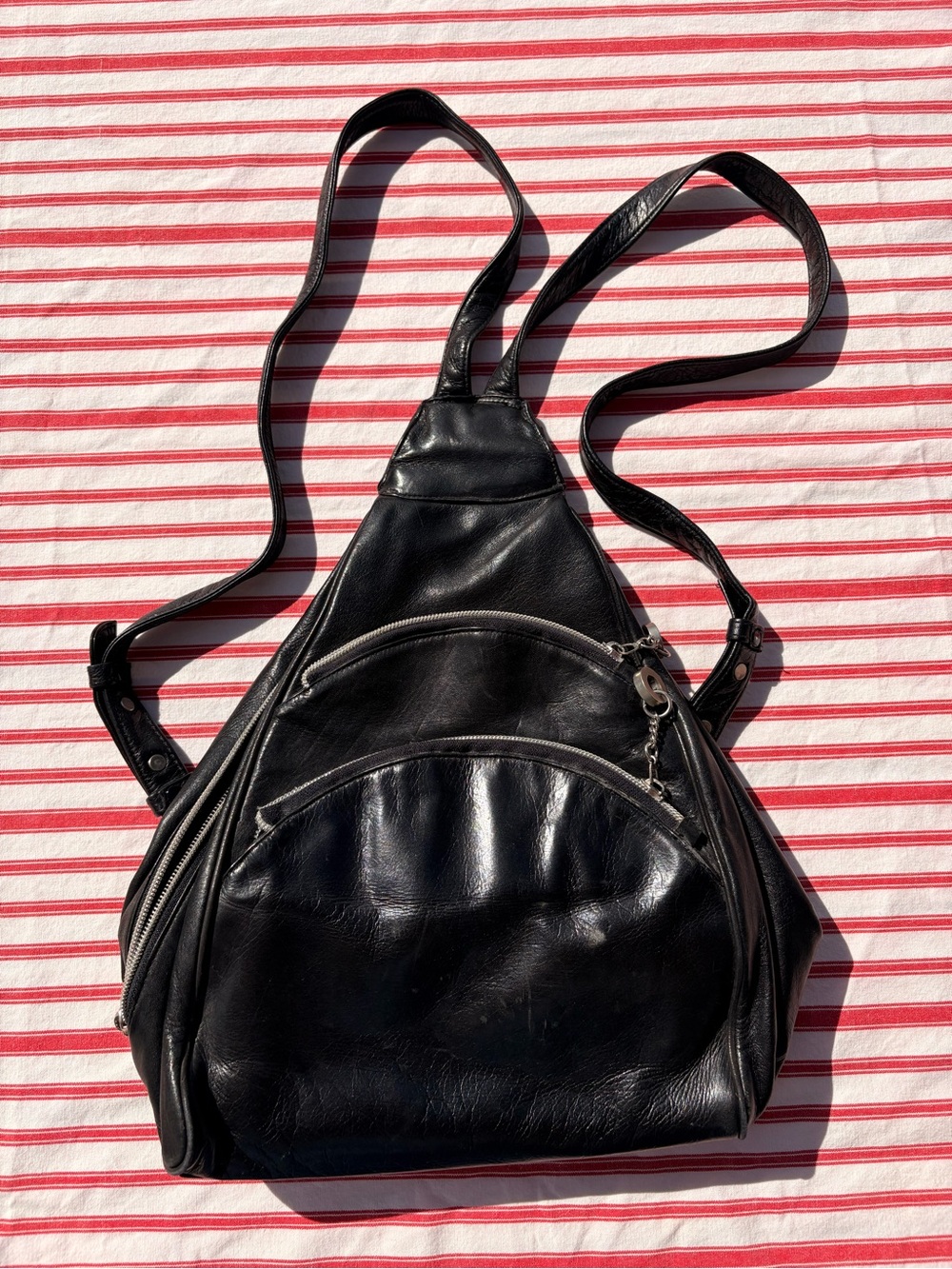 Perlina Black Leather Womens Triangle Sling Backpack